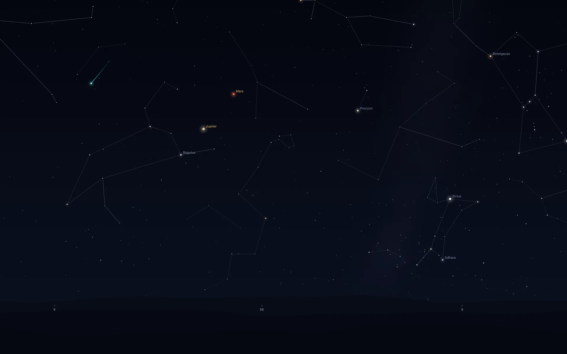 A dark starry sky facing southeast with faint constellation lines. High on the left, a white point with a short cyan trail. To its right, Mars and Jupiter are labelled, with Regulus, Procyon, Sirius, Adhara and Betelgeuse labelled across the sky and E, SE and S marked along the dark hills at the bottom.